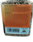 Detailed view of a label for Natural Box Turtle Food by Zoo Med, emphasizing the feeding instructions and a selection of nutritious ingredients such as soy, alfalfa meal, and dried lima beans, rich in fiber. The label includes the brand name "Zoo Med" and displays a barcode at the bottom.