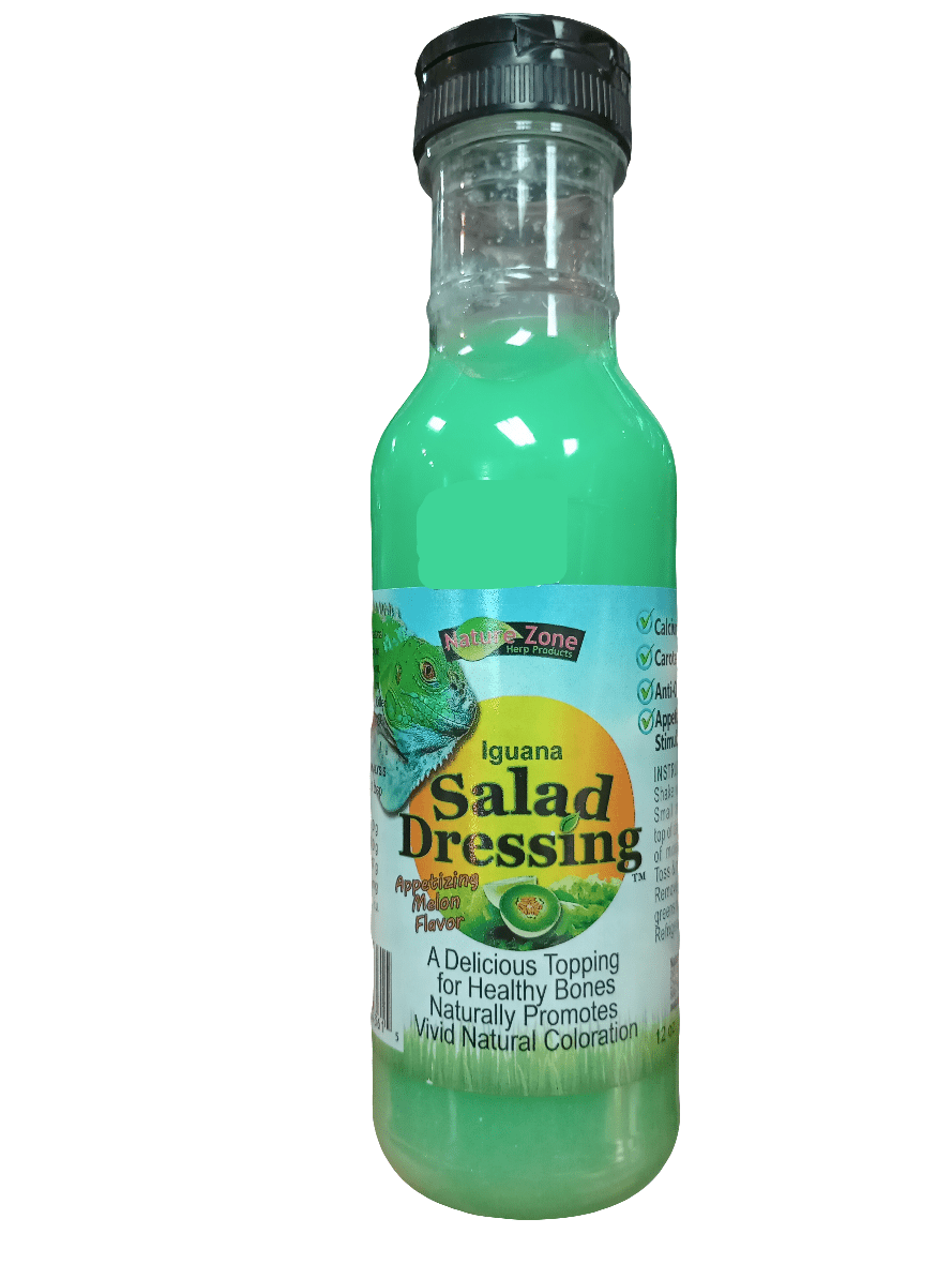 A bottle of Nature Zone Iguana Salad Dressing, containing a green liquid, is adorned with a label featuring an iguana and text highlighting it as a delicious and nutritious topping. The cap is black.