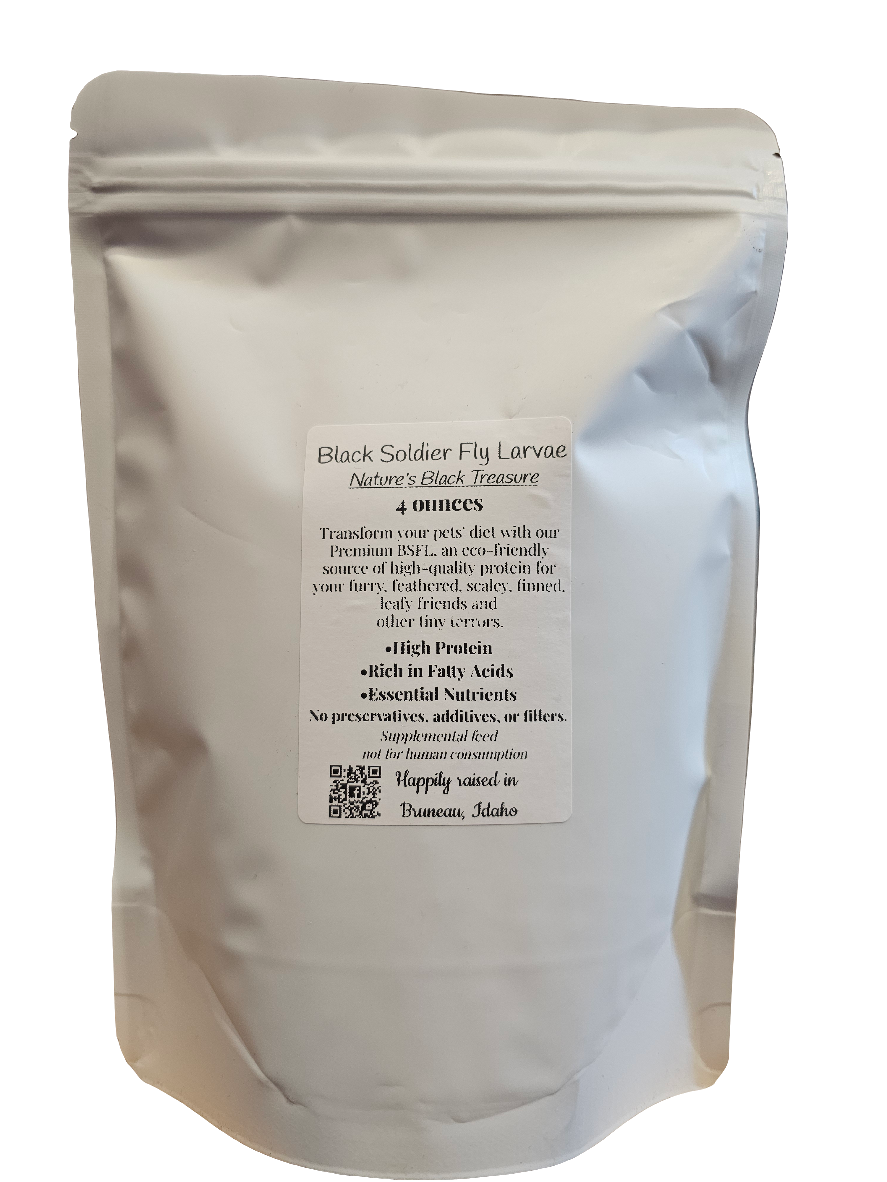 A white resealable package labeled Obsidian Fly Co. - Black Soldier Fly Larvae - Dehydrated 4 oz showcases its Kuna, Idaho origins, high protein, and healthy fats. A QR code is at the bottom for more details.