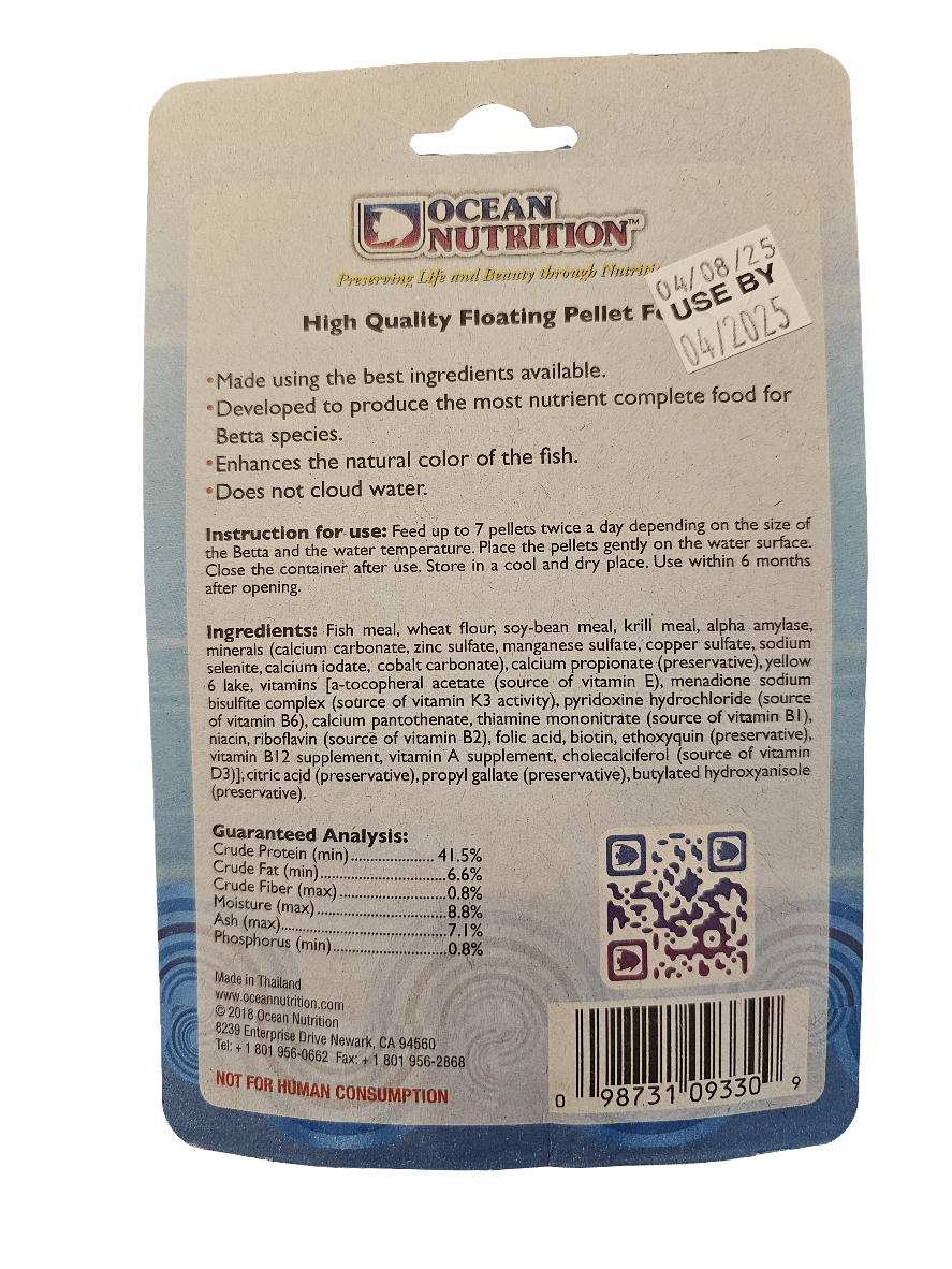 Back of Ocean Nutrition - Betta Pellets 15g package displays product description, ingredients list, instructions, guaranteed analysis, and barcode. Promotes enhanced color and vitality in Betta fish. Not intended for human consumption. Expiration date stickers are visible.