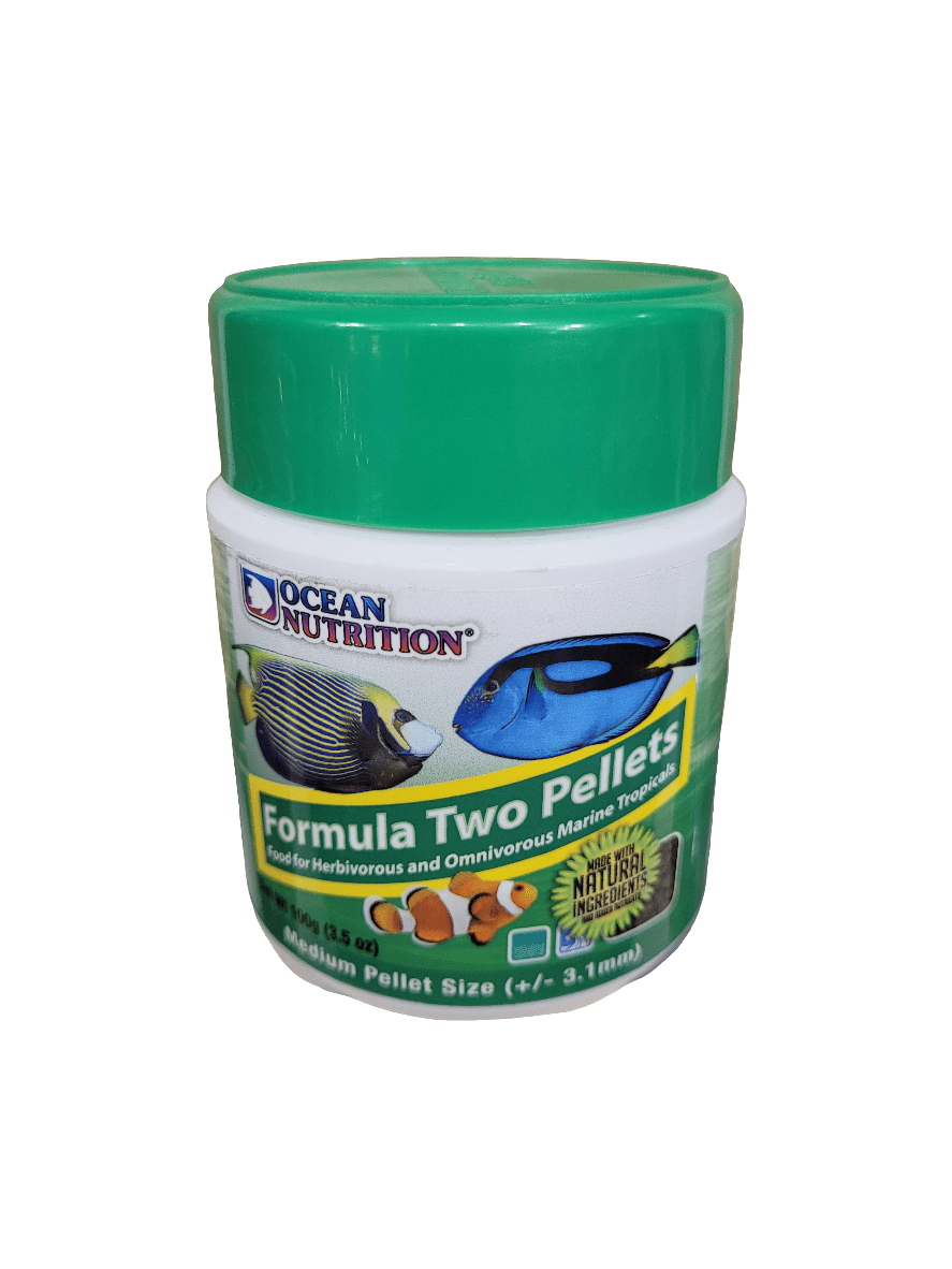 A 100g container of Ocean Nutrition Formula Two Pellets, featuring medium sinking pellets designed for herbivorous and omnivorous marine tropical fish. The packaging showcases images of vibrant fish and specifies the pellet size as 1.3 mm.