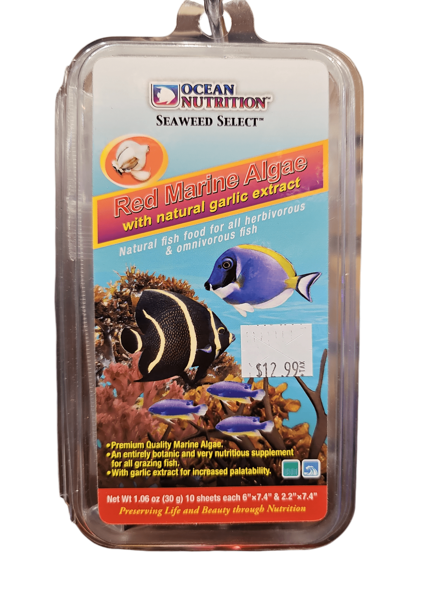 The packaging of Ocean Nutrition Seaweed Select Red Marine Algae 30g features vibrant images of fish, complemented by text that describes it as natural fish food formulated for herbivorous and omnivorous species. The product includes natural garlic extract and is priced at $12.99.