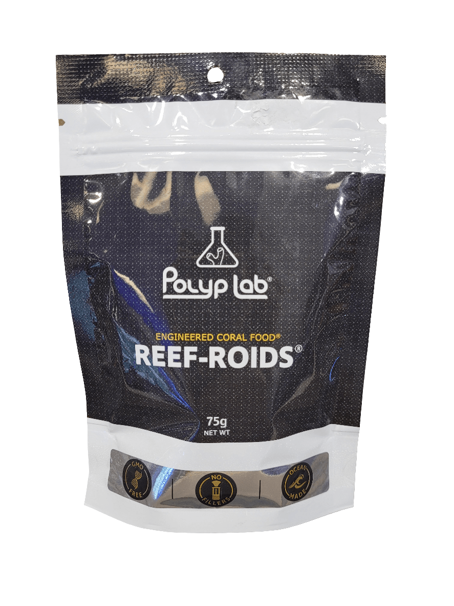 A package of Polyp Lab - Reef Roids - 75g coral food. The black and white packaging prominently displays the product name and weight on the front.