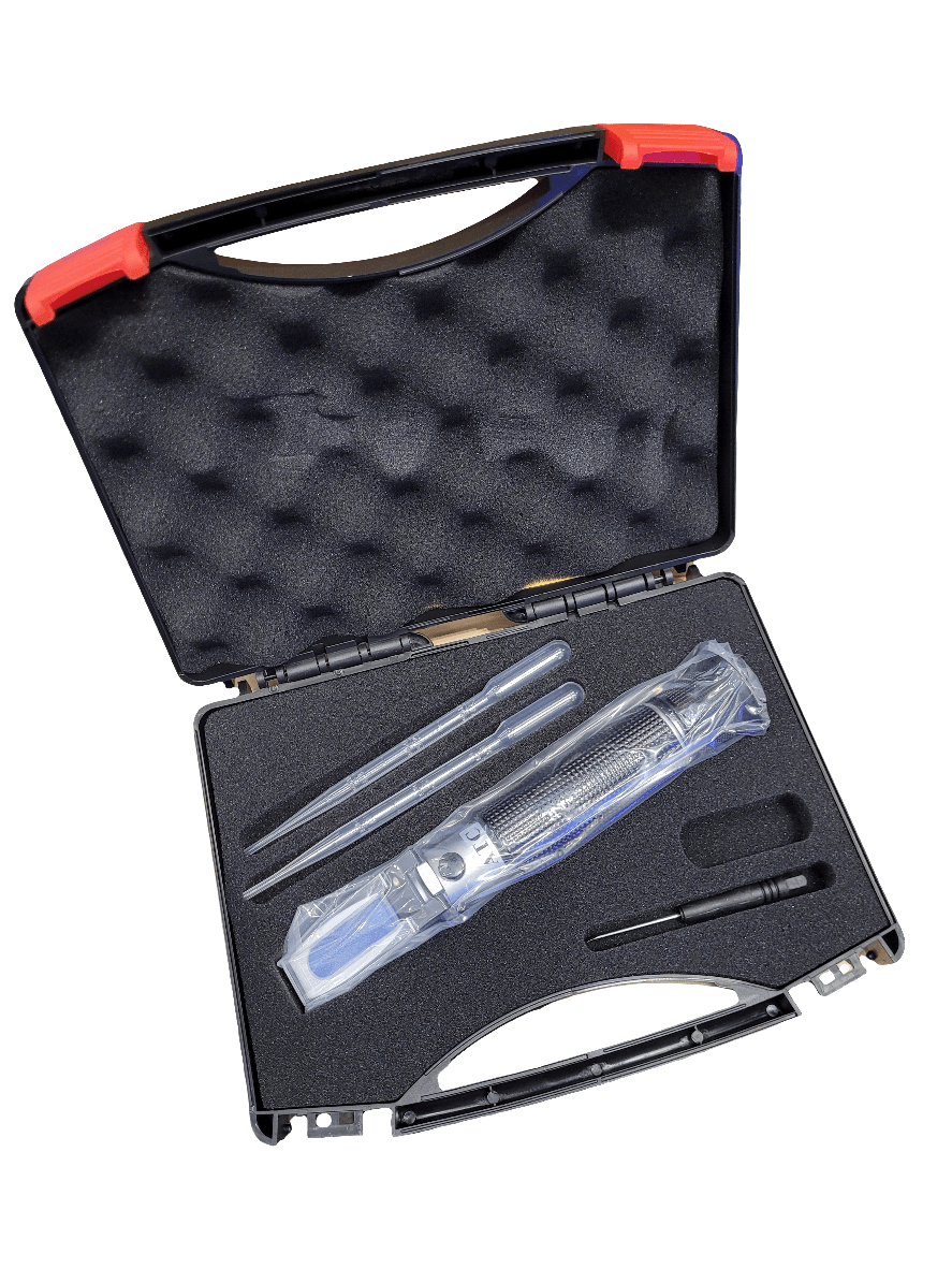 A black carrying case with foam padding holds the Pro Refractometer securely in a molded compartment. The case also contains additional small black and metallic accessories, ready for transport.