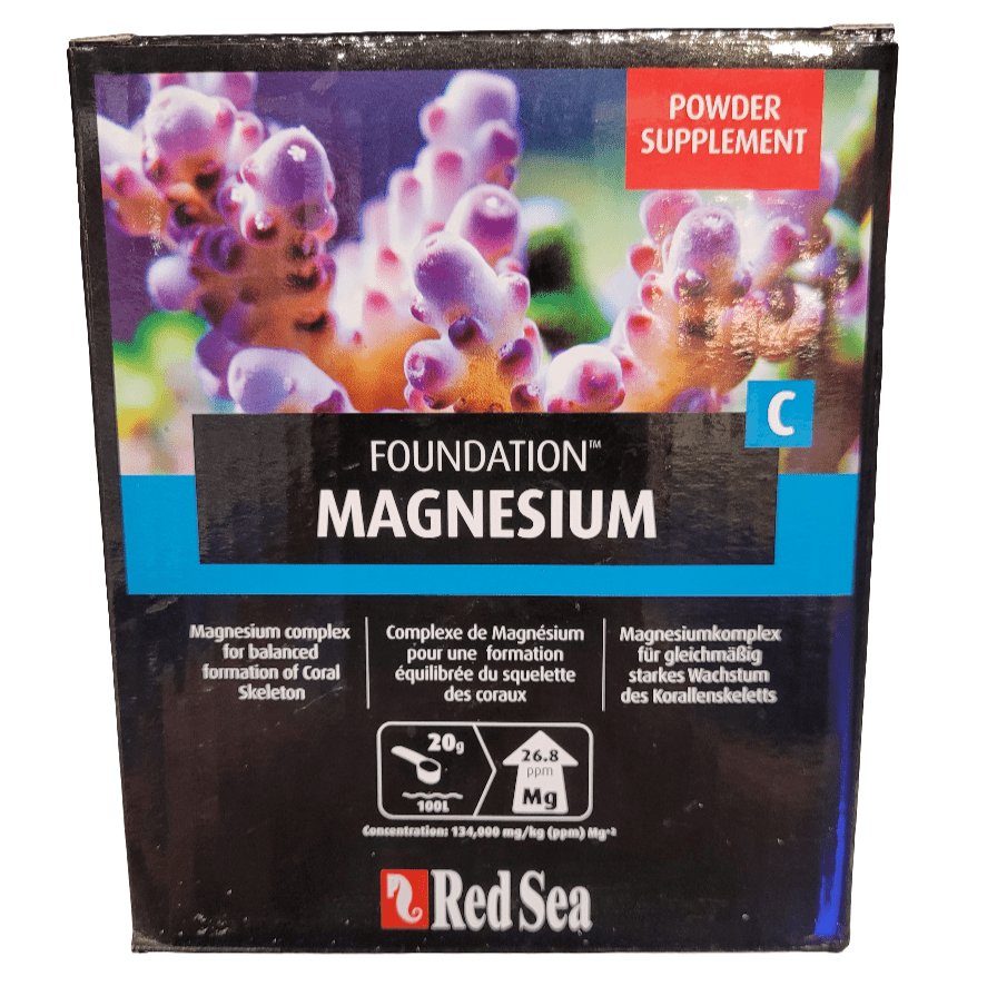 A 1kg box labeled "Red Sea - Foundation Magnesium," described as a powder supplement for coral skeleton formation, featuring a colorful coral reef image on the packaging along with details in multiple languages.