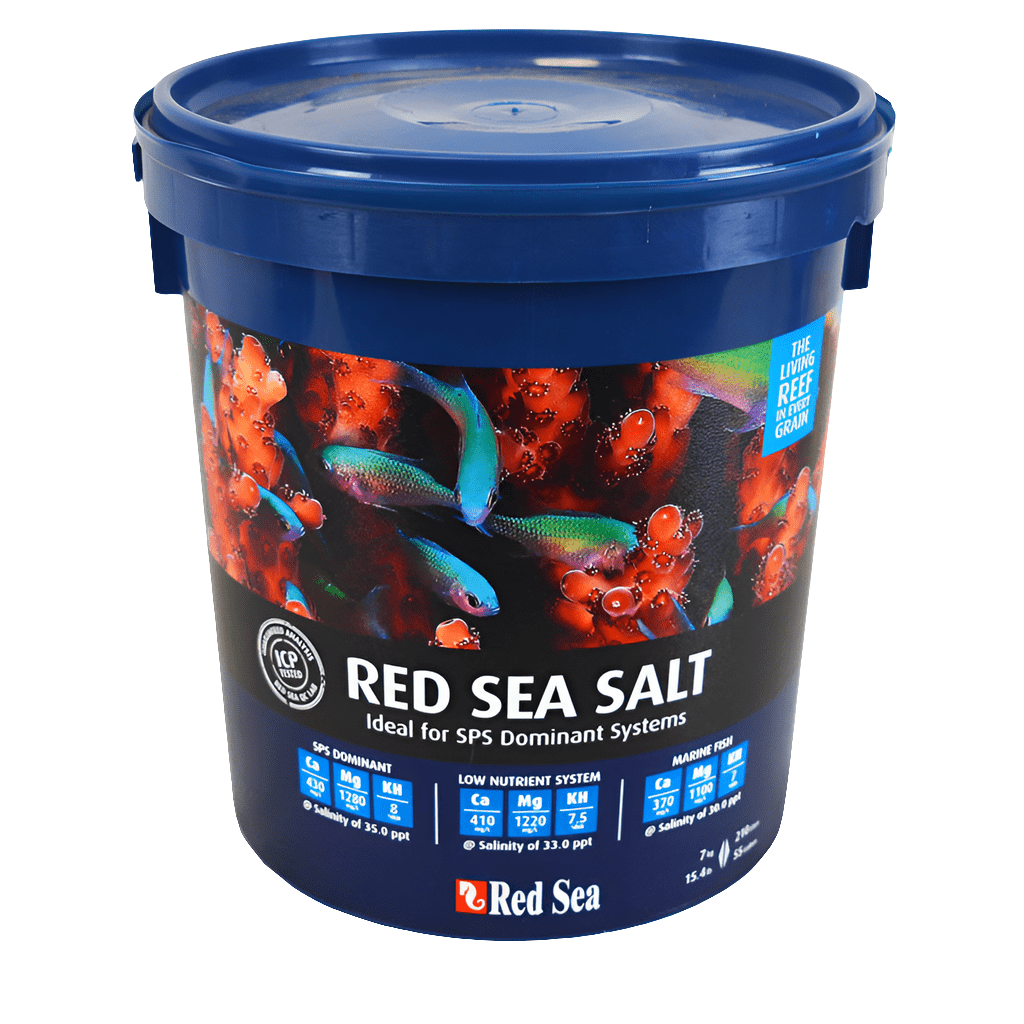 A blue bucket labeled "Red Sea Salt 55 Gallon Dry Mix" features vibrant images of coral and fish. The text emphasizes its suitability for SPS dominant systems, outlining specifications for calcium, magnesium, and alkalinity levels.