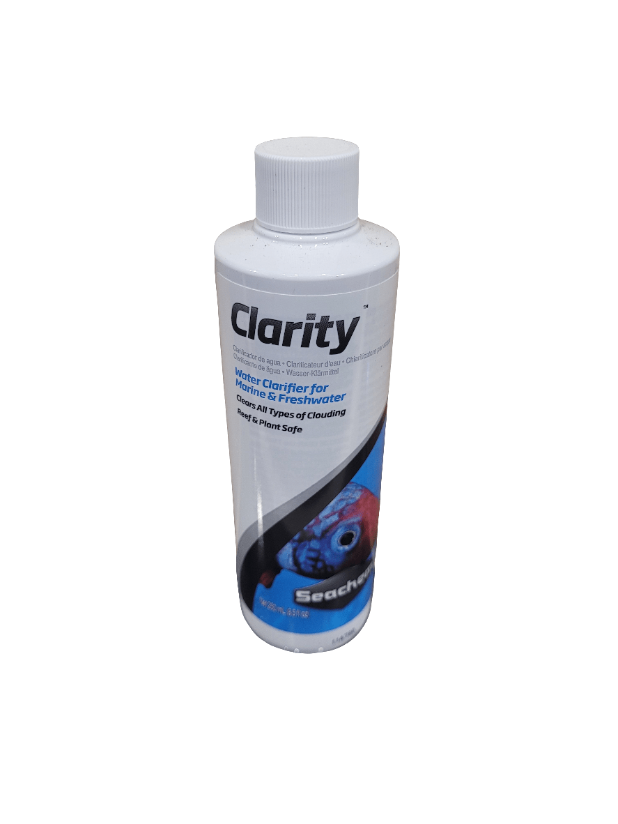 A 250ml bottle of aquarium water clarifier labeled Seachem - Clarity, suitable for both marine and freshwater environments, safe for plants and reefs, featuring a fish image on the label.