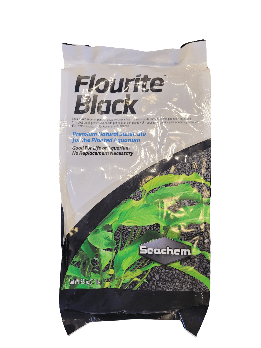 A 3.5 kg (7.7 lbs) bag of Seachem - Flourite Black substrate for aquariums features packaging with green aquatic plants and emphasizes that it is a natural substrate ideal for planted aquariums.