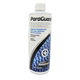 A white bottle of Seachem - Paraguard, showcasing blue fish scale graphics, is labeled to eliminate ectoparasites and fungal, bacterial, and viral lesions. It contains 500 mL.