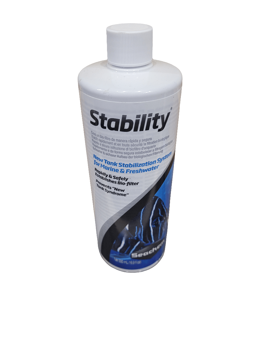 A 500ml bottle of Seachem Stability aquarium product, designed with a white cap and a label that portrays it as a tank stabilization system suitable for both marine and freshwater aquariums. The label features an image of a fish and water, along with text that emphasizes its advantages.