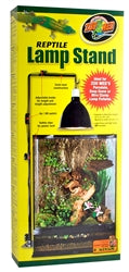 Image of a Zoo Med - Reptile Lamp Stand Large box featuring a yellow background with the stand set up over a terrarium, highlighting it as ideal for suspending reptile lamps above terrariums.