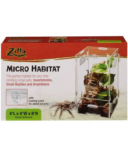 The box packaging for the Zilla Micro Habitat - Large Aboreal, a spacious enclosure for invertebrates, small reptiles, and amphibians, features a locking latch for security and displays an image of the habitat with plants inside. The dimensions are 8L x 6W x 14H.