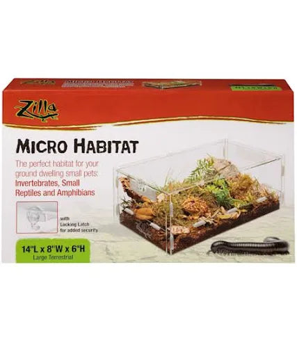 The Zilla Micro Habitat - Large Terra (14 x 8 x 6) packaging features a clear enclosure with natural decor for small pets like invertebrates, reptiles, and amphibians. It includes a lock for security and highlights its dimensions.