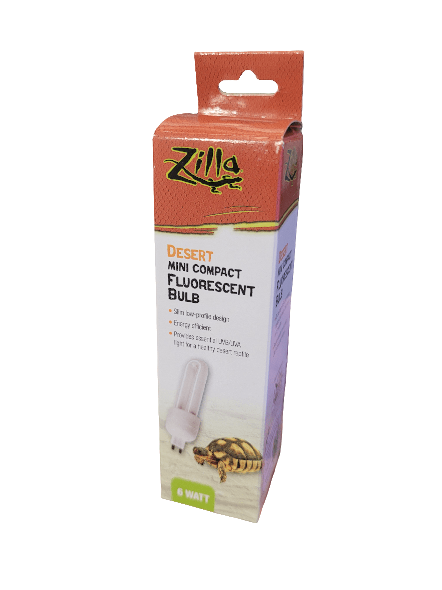 A box of Zilla - Mini Desert UVB - 6 watt bulb. The packaging displays an image of a tortoise and includes information regarding the bulb's energy efficiency and its suitability for desert reptiles. The box is orange and comes with a hook for hanging.