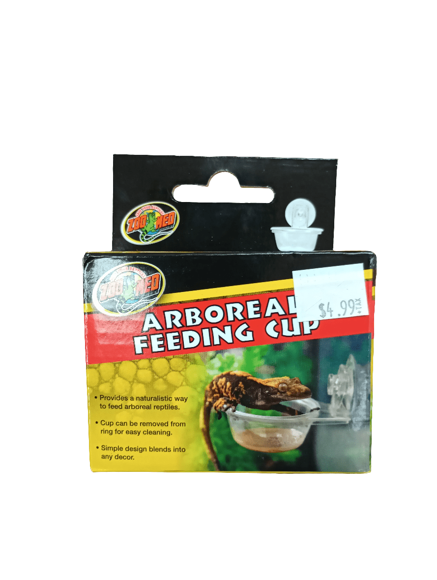 A black and yellow package for a Zoo Med Arboreal Feeding Cup featuring an image of a chameleon using the feeding cup. The package includes a price sticker of $4.99 and highlights features for feeding arboreal reptiles.