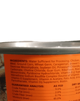 A close-up of a Zoo Med Blue Tongue Skink & Tegu Food can, showing the ingredients list. The can includes chicken, soybean meal, and various vitamins and minerals. A barcode is partially visible on the right side.