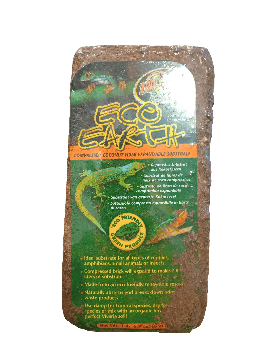 A package of Zoo Med Eco Earth 1 Brick compressed coconut fiber substrate features a label with a green lizard and includes information about the product's eco-friendly benefits, recommended use, and suitability for reptiles and small animals.