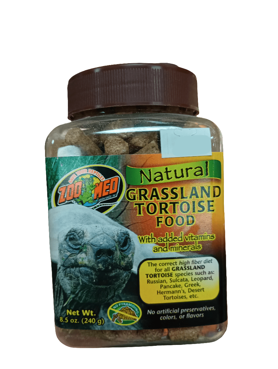 A bottle of Zoo Med Natural Grassland Tortoise Food 8.5oz, enriched with vitamins and minerals. The packaging displays an image of a tortoise and emphasizes a high-fiber diet ideal for different tortoise species, with a net weight of 8.5 oz (240 g).