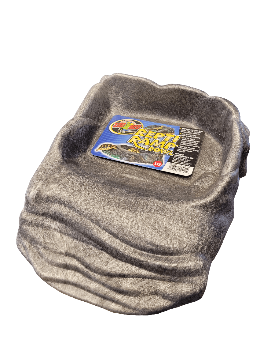 A gray, rock-like water dish for reptiles featuring a layered steps design, labeled as the Zoo Med - Repti Ramp Bowl - Large on the inside with text and graphics that promote its suitability for reptiles.