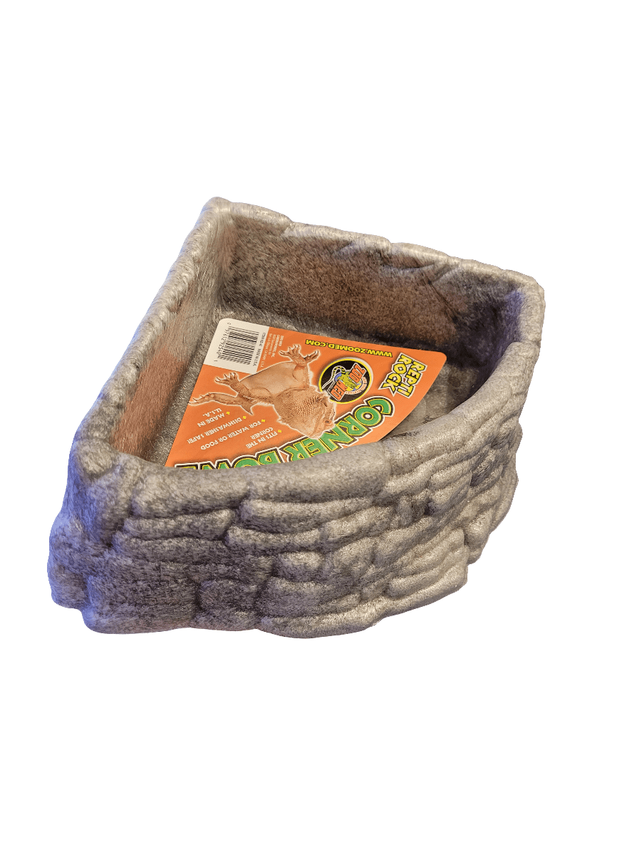 A gray, stone-textured large corner bowl with soft lining from Zoo Med, featuring a colorful label with a lizard image.