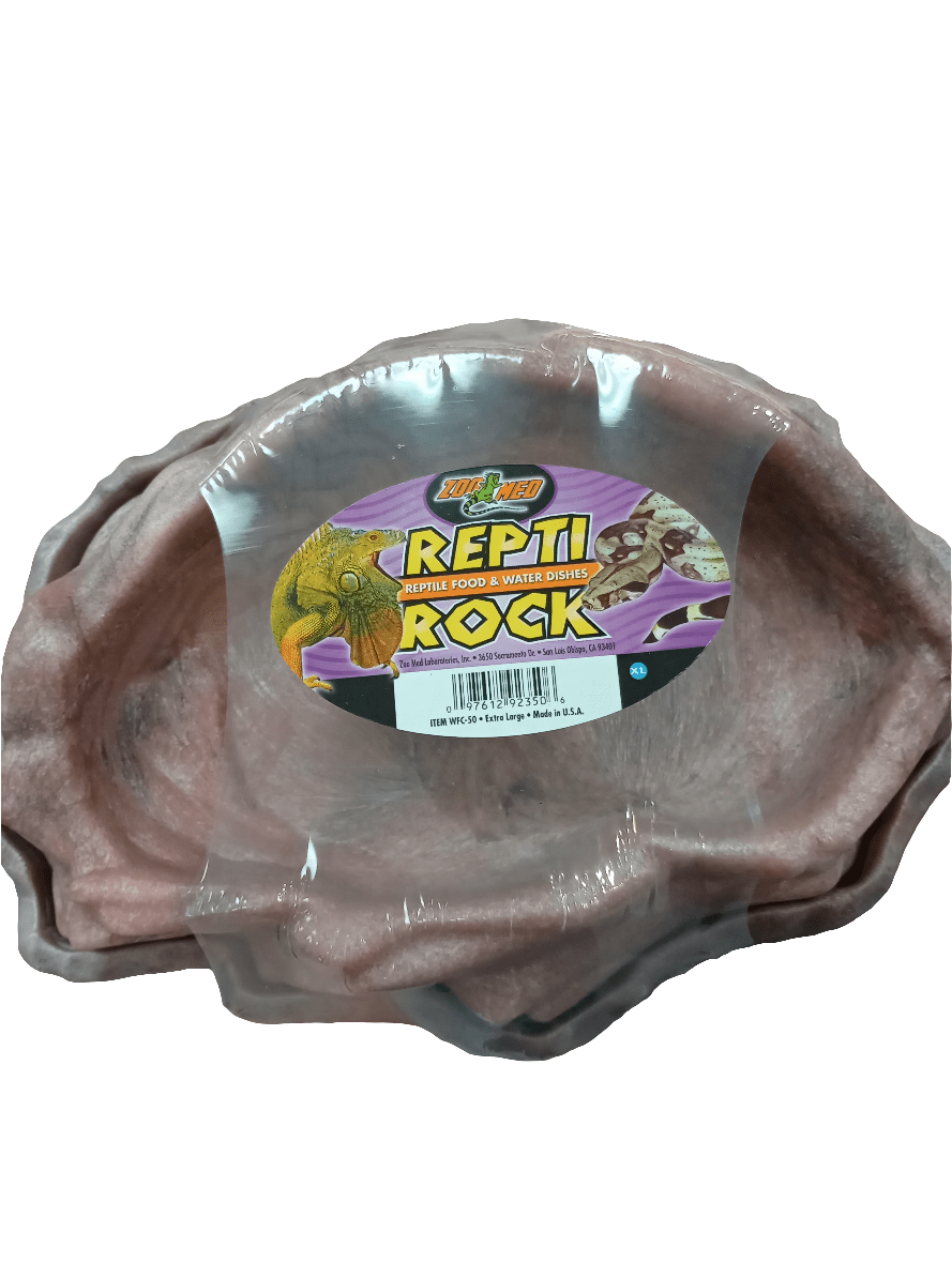 An extra-large reptile food and water dish with a rock-like texture, branded as Zoo Med ReptiRock. The packaging displays a range of reptile images, and the dish is new and encased in plastic.