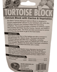 The image displays the packaging for Zoo Med Tortoise Block, which features a calcium block with cactus and vegetables. The reverse side of the package contains a product description, directions for use, guaranteed analysis, and ingredient details.