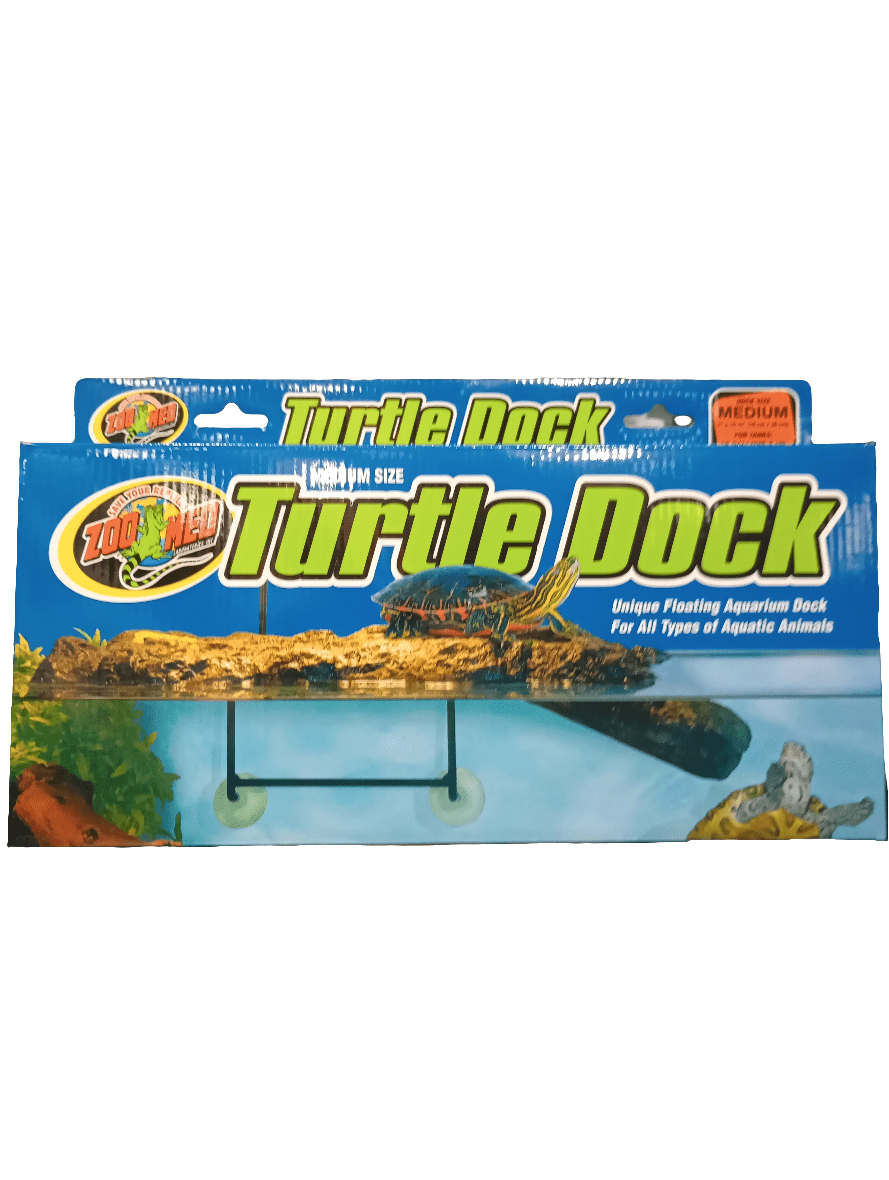 Packaging for a Zoo Med Turtle Dock Med. The box displays an image of a floating aquarium dock set within a water environment, specifically designed for turtles. It incorporates vibrant blue and green colors, along with turtle imagery and detailed product information in the design.