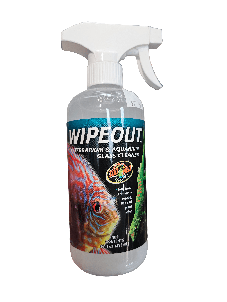 The Zoo Med - Wipeout Glass Cleaner - 16oz spray bottle, adorned with images of a fish and a plant, contains 16 fluid ounces (473 ml) of solution. Its non-toxic formula, safe for both aquatic life and plants, easily removes hardwater deposits using plant-based ingredients.