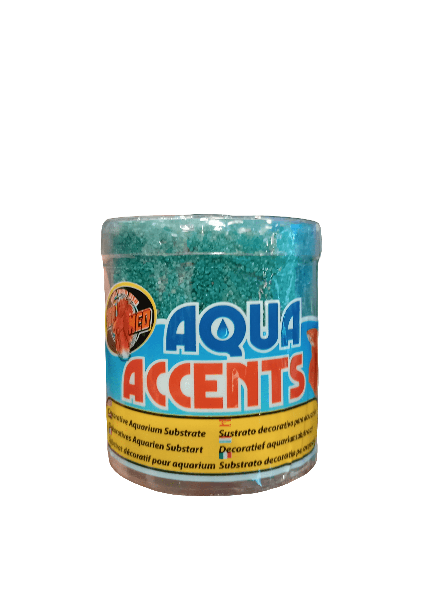 A clear plastic jar labeled ZooMed - Aqua Accents Terminator Teal Sand containing turquoise decorative aquarium substrate. The label features orange and blue text with a small graphic of an aquarium on a yellow background.