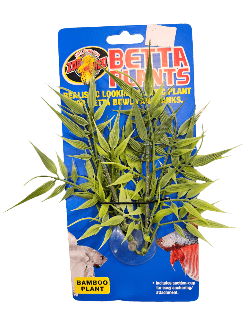 A packaged decorative plastic plant labeled as ZooMed - Betta Plant - Bamboo Plant, featuring green bamboo-style leaves. It is designed for use in Betta fish tanks and includes a suction cup for easy attachment. The packaging showcases an image of a Betta fish.