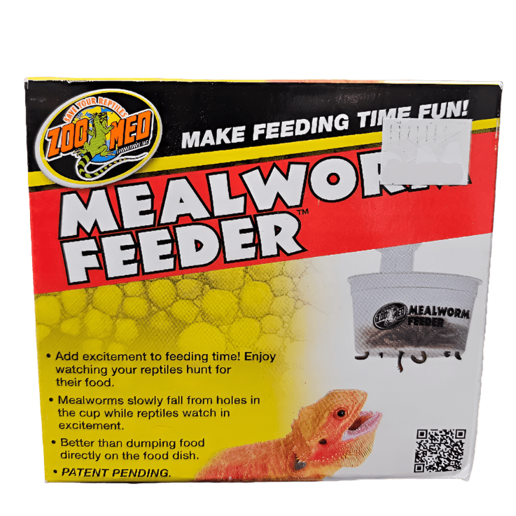 Introducing the ZooMed Mealworm Feeder featuring vibrant graphics. This design emphasizes the excitement of feeding time and encourages observing reptiles as they hunt. The illustration includes a lizard alongside mealworms in the feeder, accompanied by a QR code and marked with "PATENT PENDING.