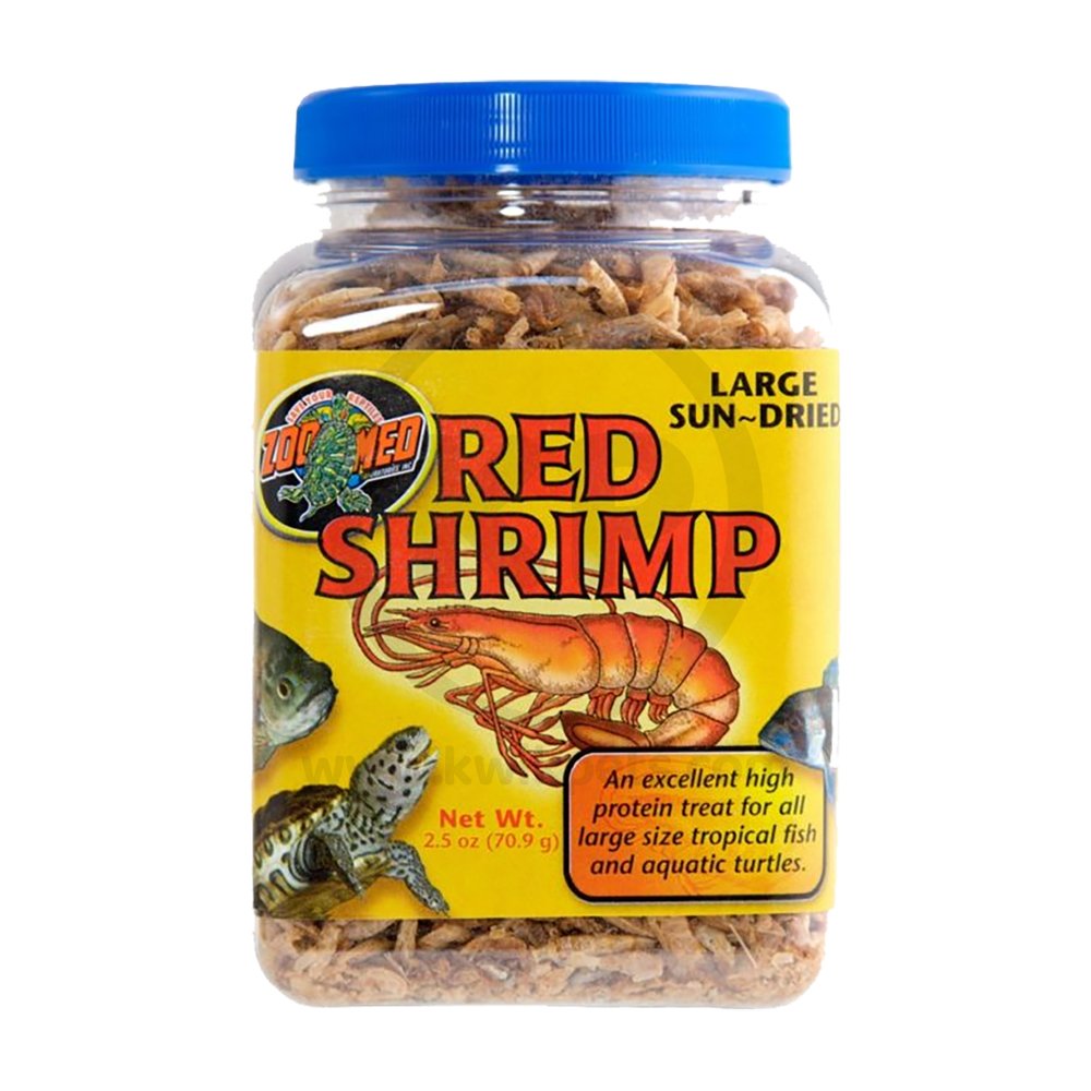 A 2.5 oz jar of ZooMed Red Shrimp features a yellow label with an image of a shrimp and illustrations of various fish. The label indicates that it is a high-protein treat for fish and turtles, and the jar has a blue cap.