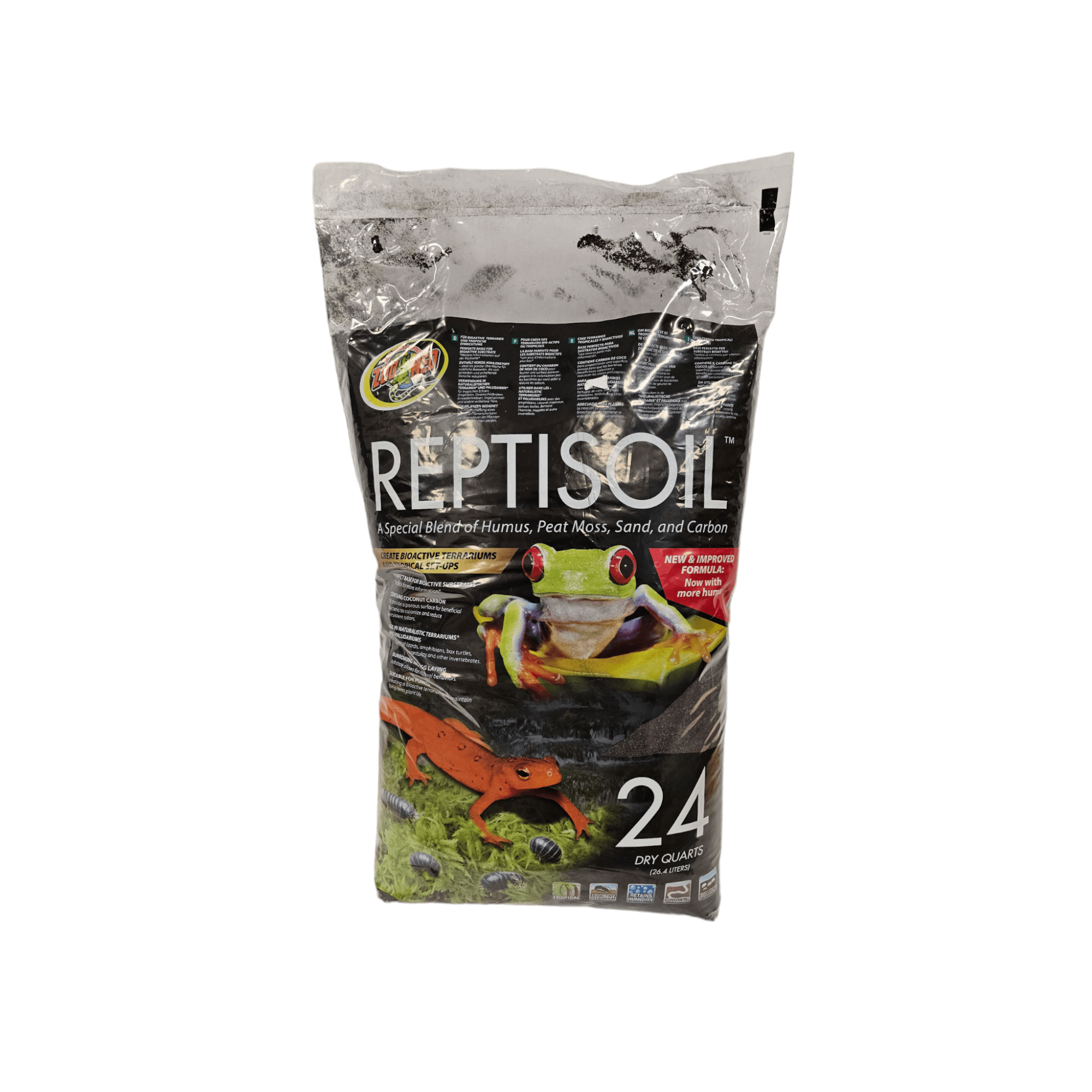 A bag of ZooMed ReptiSoil 24qt, displaying images of a green frog and a bright orange salamander, is labeled as containing a special blend of humus, peat moss, sand, and carbon.