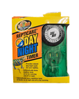 A ZooMed - Repticare- Day/Night Timer is in its packaging. The box is yellow with a vibrant logo, highlighting its purpose for reptile lighting and managing day/night cycles. It includes automatic lamp control with a circular analog timer and electrical outlets set on a green base.