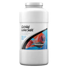 A container of Seachem Cichlid Lake Salt, in white with a red fish image, offers vital elements for Rift Lake African cichlids.