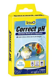 A yellow box of Tetra Correct PH tablets for aquariums features fish images and highlights its ability to maintain neutral pH, reducing stress from fluctuations. It contains 8 tablets, recommended for monthly use.